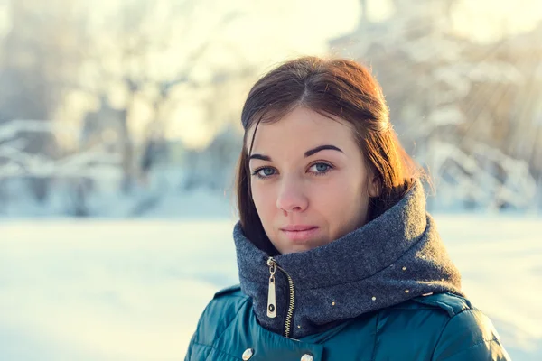 Portrait of young brunette girl in jacket — Stock Photo, Image