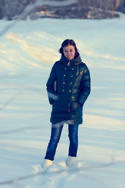 Portrait of young brunette girl in jacket Stock Image