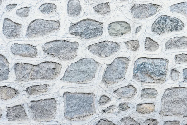 Parte abstrata de uma cerca velha de pedra — Fotografia de Stock