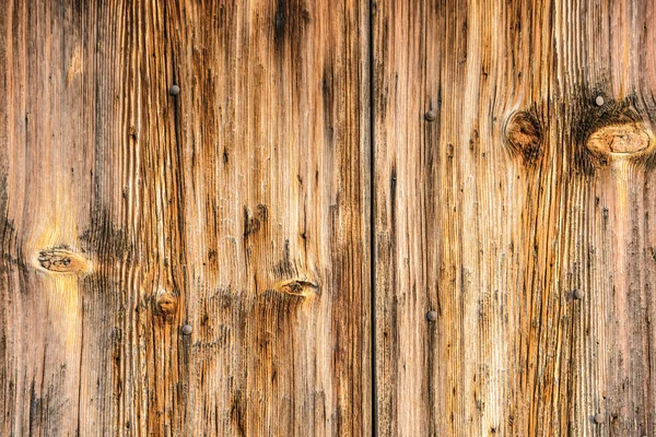 Deel van de muur van de oude ruwe houtstructuur — Stockfoto
