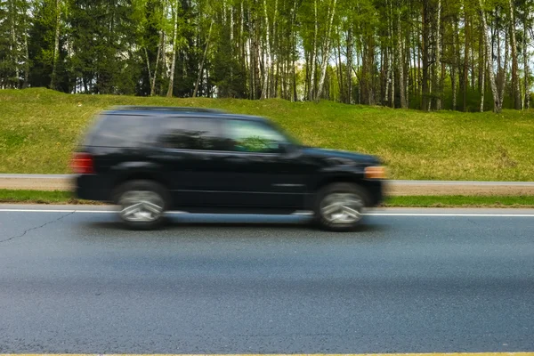 Coche en movimiento — Foto de Stock