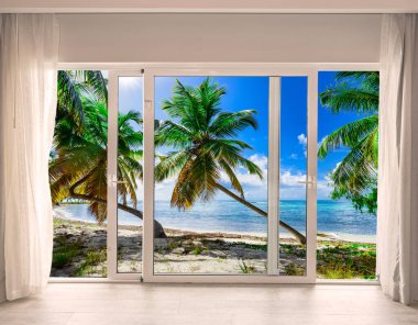 Cennetin kumsalına bakan büyük cam kapı.