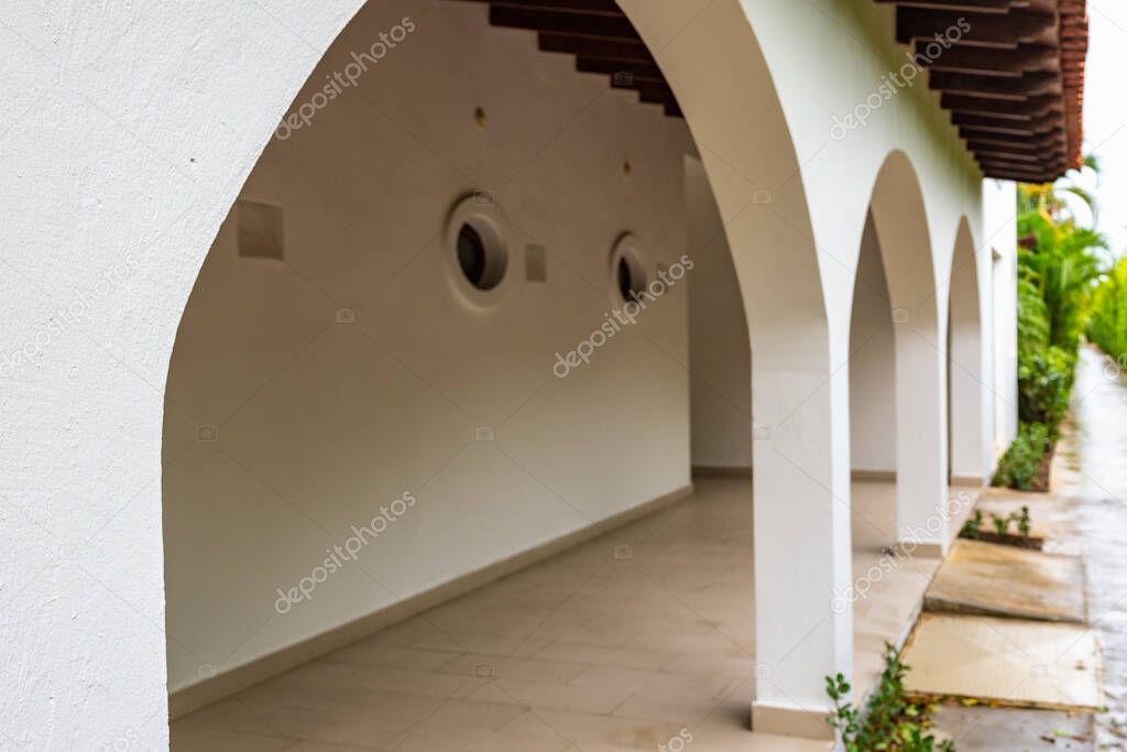 architecture white stone building porch entrance arch from several arches in a row