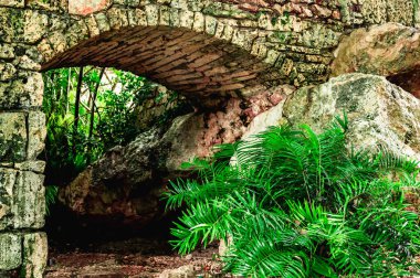 ancient arch built of stone in the village  Altos de Chavon