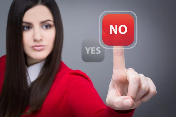 Businesswoman in red clicking no button — Stock Photo, Image