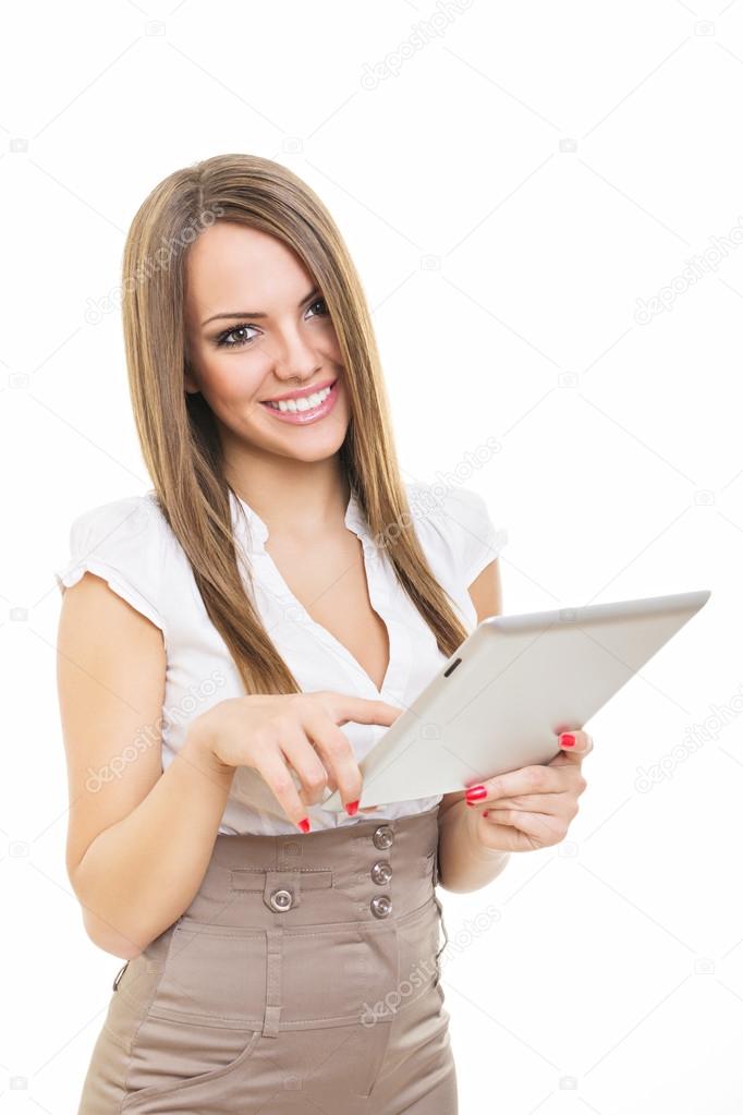 Happy attractive young female boss using digital talbet