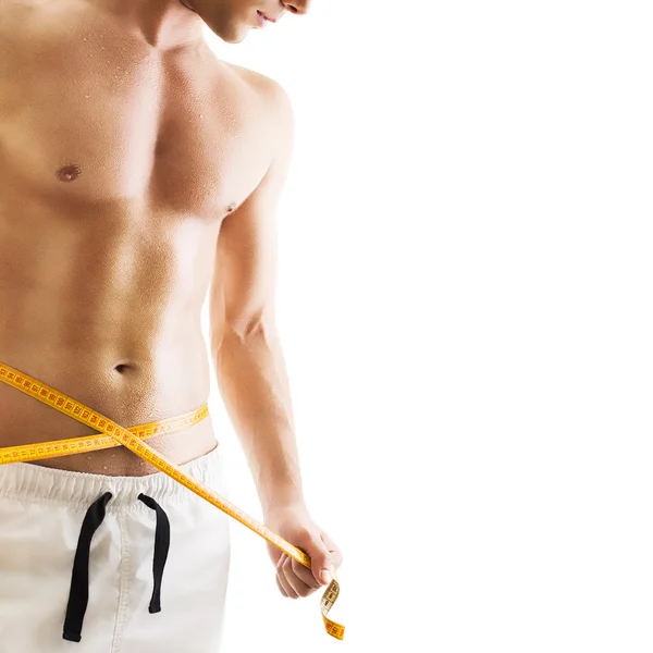 ölçme bant ile yakışıklı genç