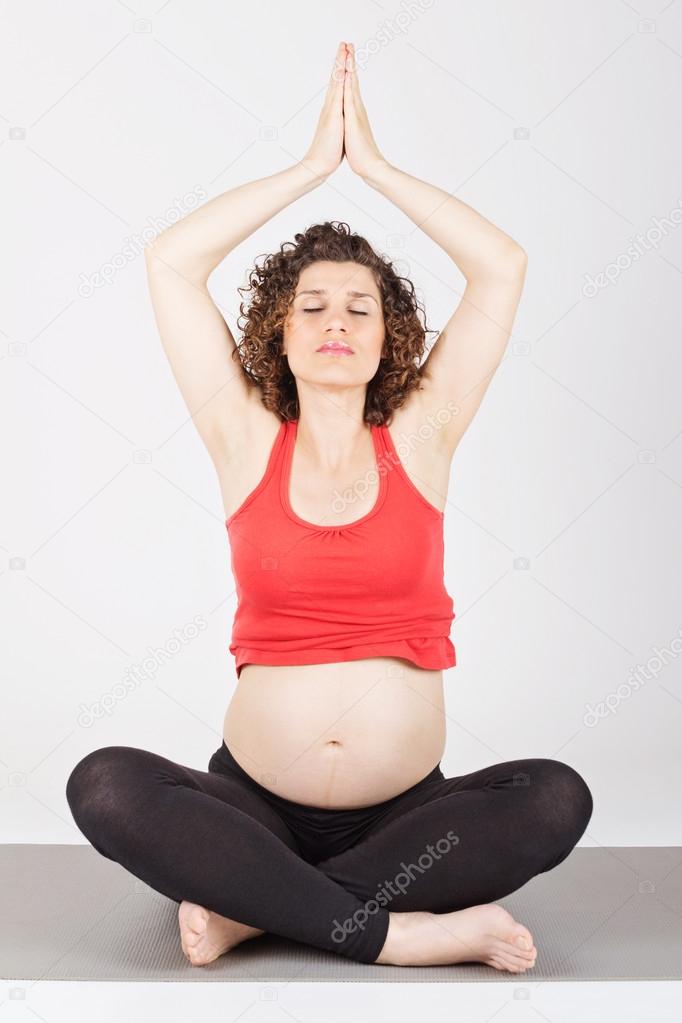 Pregnant woman doing yoga