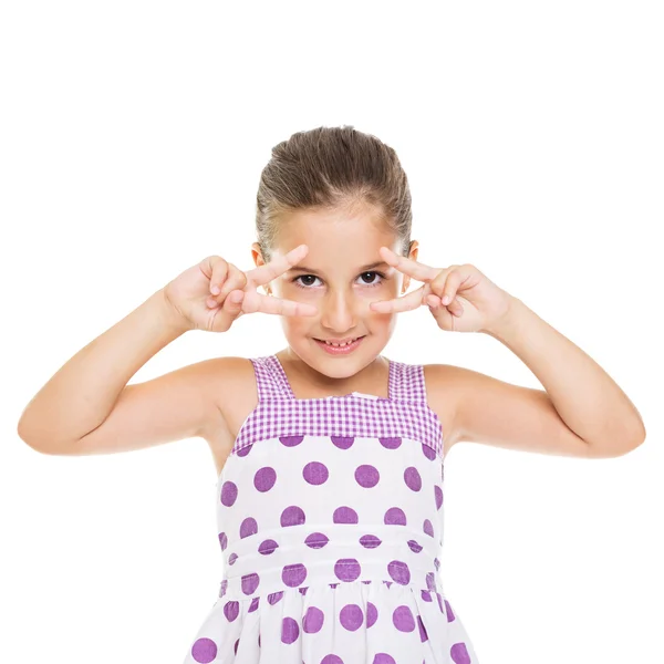 Cute girl in purple dress posing — Stock Photo, Image