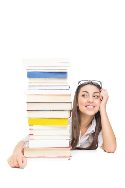 Linda adolescente estudiante con pila de libros —  Fotos de Stock