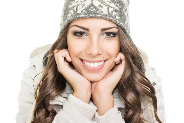 Gorgeous young woman wearing winter hat and jacket smiling — Stock Photo, Image