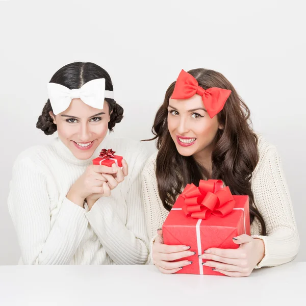 Cute teenage girls with Christmas presents — Stock Photo, Image