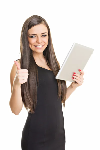 Attractive businesswoman using tablet computer showing thumb up — Stock Photo, Image