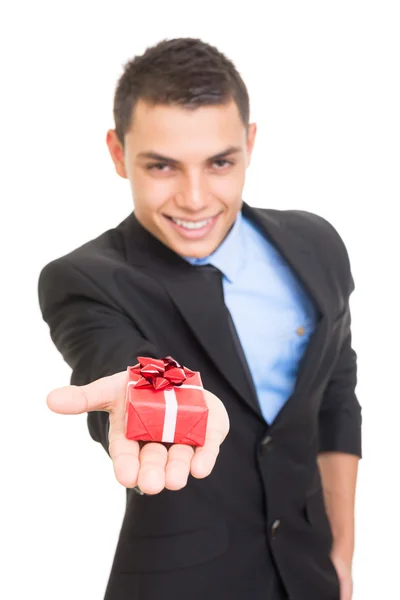 Businessman giving a gift — Stock Photo, Image