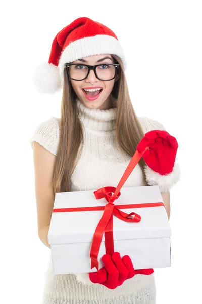 Cute teenage girl opening Christmas present — Stock Photo, Image