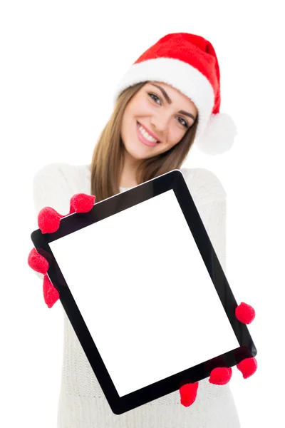 Felice giovane donna con Santa cappello mostrando tablet computer — Foto Stock