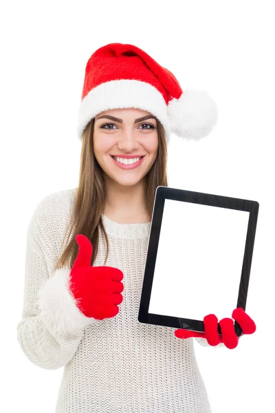 年轻漂亮的圣诞老人女孩现身平板电脑和拇指 — 图库照片