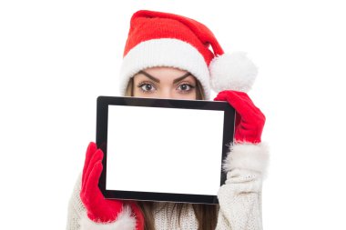 tablet bilgisayar arkasına saklanarak sevimli Noel Baba kız