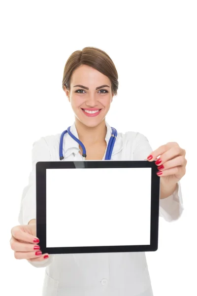 Confident female doctor smiling showing tablet computer — Stock Photo, Image