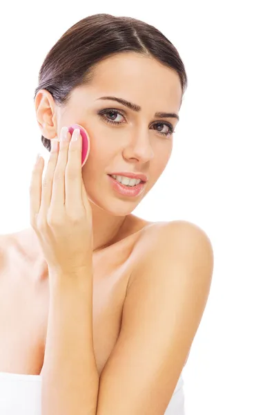 Beautiful young woman applying shine control makeup — Stock Photo, Image