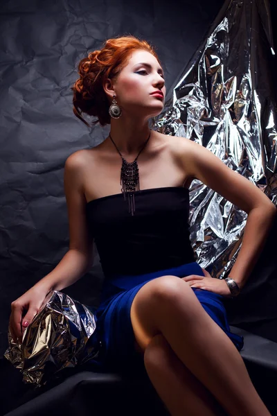 Vintage portrait of a seductive ginger model with silver foil po — Stock Photo, Image