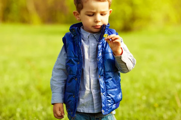 Stylish serious baby boy with ginger (red) hair in trendy stripe — Stock Photo, Image