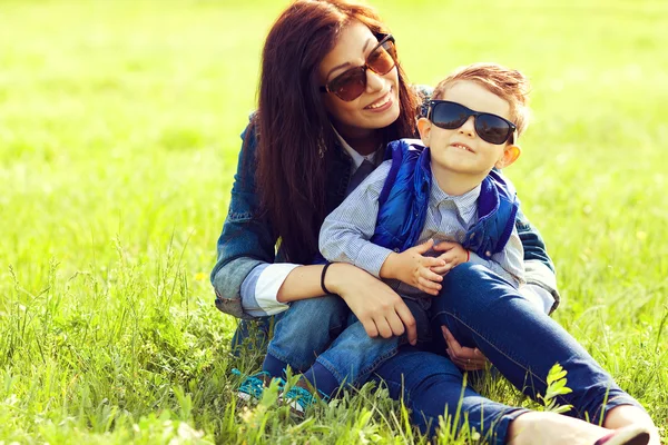 Portrait of fashionable baby boy and his stylish mother in trend — Stock Photo, Image