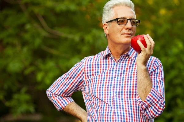 Healthcare concept. Portrait of a smiling mature (old) man in ca