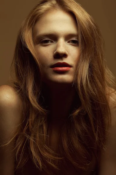 Emotive portrait of a fashionable model with red (ginger) curly — Stock Photo, Image