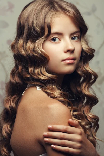 Portrait of a little princess smiling and posing over vintage ba — Stock Photo, Image