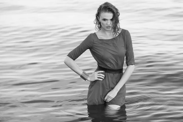 Fashion portrait of a young model with wet long ginger curly hai — Stock Photo, Image