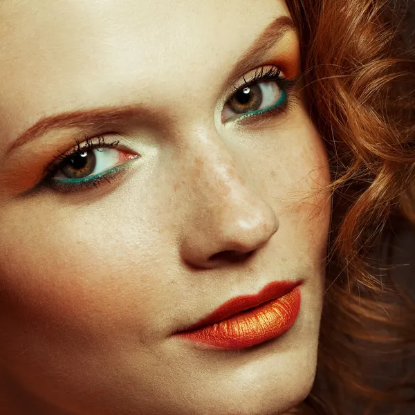 Emotive portrait of a fashionable model with red (ginger) curly — Stock Photo, Image