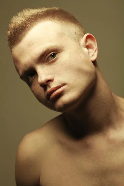 Male beauty concept. Portrait of fashionable and undressed young — Stock Photo, Image