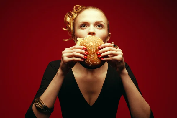 Fashion & Gluttony Concept. Portrait of luxurious red-haired model — Stock Photo, Image