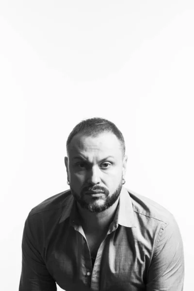 Emotive Portrait Bearded Charismatic Muscular Years Old Man Sitting White — Stock fotografie