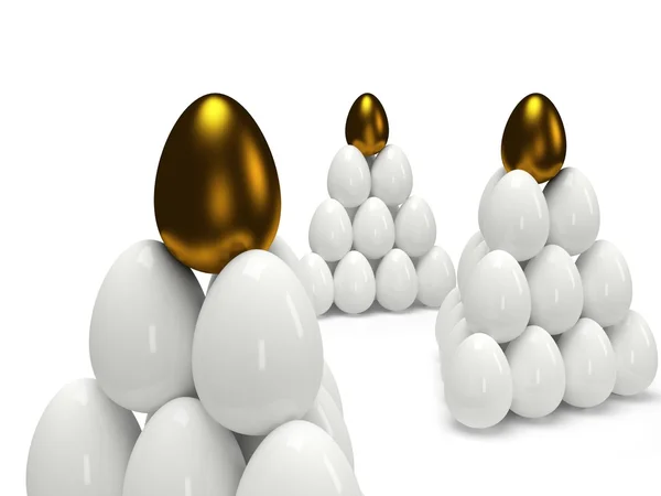 Pyramids of shiny golden and white eggs — Stock Photo, Image