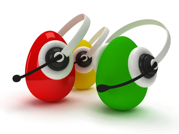 Colored eggs with headsets isolated over white — Stock Photo, Image