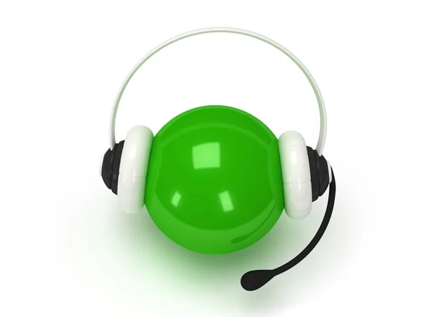 Zielony kula z zestawem słuchawkowym na białym tle nad białym — Zdjęcie stockowe