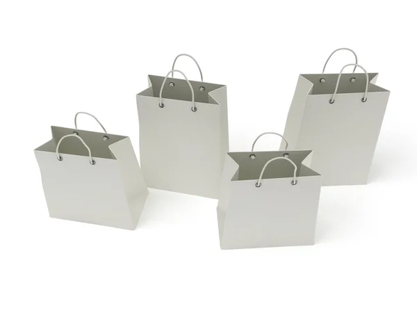 Four classic white shopping bags (3d render) — Stock Photo, Image