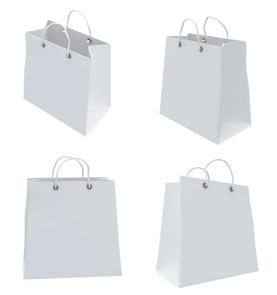 Set of four classic white shopping bags. 3d. — Stock Photo, Image