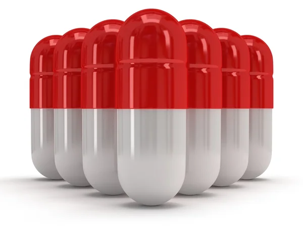 3D medizinische Pillen stehen wie eine Pyramide auf weiß — Stockfoto