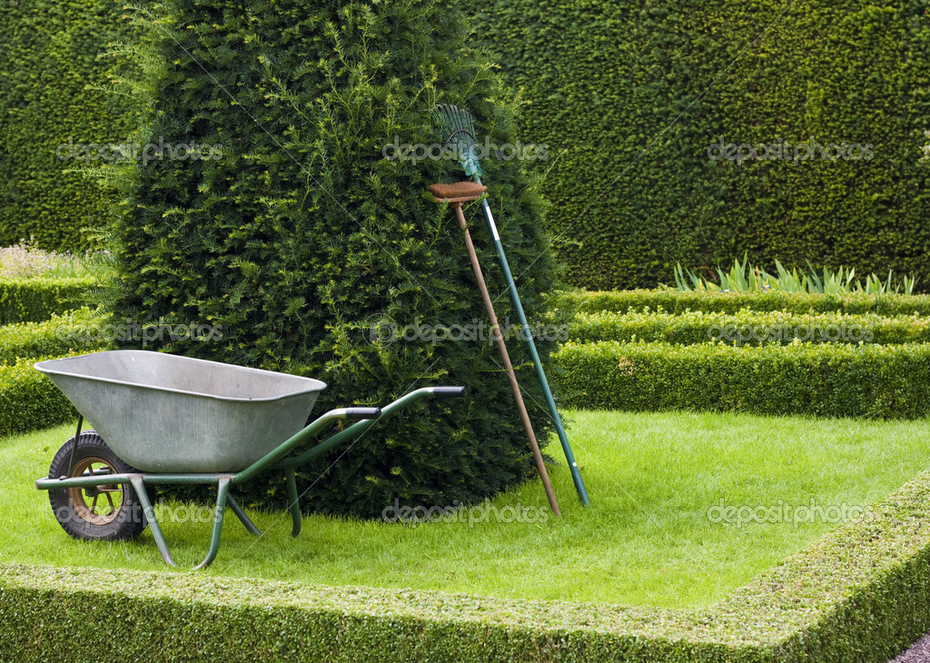 Gardening Tools In A Tudor Style Knot Garden. Stock Photo by ©jlcst