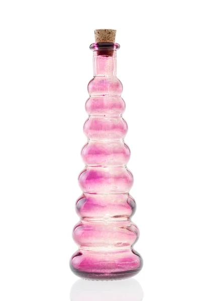 Glass bottle pink with cork stopper isolated — Stock Photo, Image