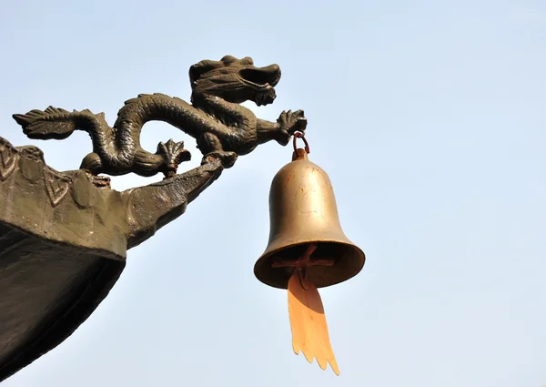 Dragon and the bells — Stock Photo, Image