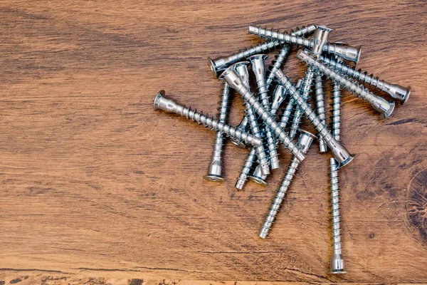 Close Hex Bolts Screw Furniture Assembly Wooden Background Top View — ストック写真