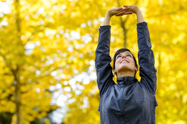 Arms up for stretching outside — Stock Photo, Image