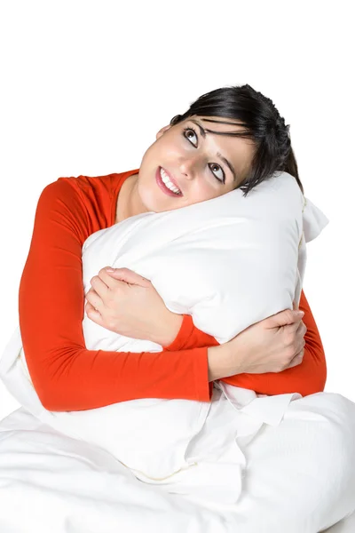 Komfortowe szczęśliwą kobietą w łóżku na białym tle — Zdjęcie stockowe
