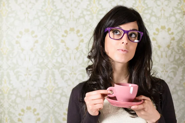 Woman thinking with cofffe cup — Stock Photo, Image