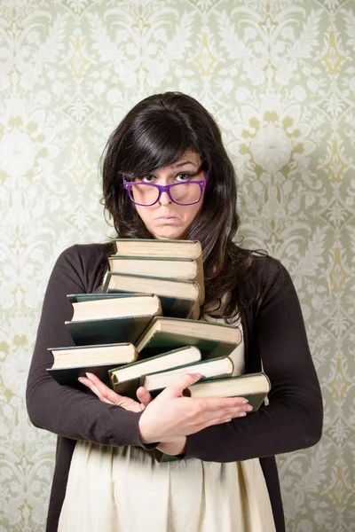 Upset woman with books — Stock Photo, Image