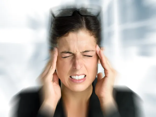 Бізнес жінка стрес і головний біль비즈니스 여자 스트레스와 두통 스톡 이미지